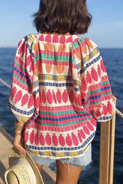 Amelia® | Casual vakantieblouses met geometrische print en knopen en V-hals