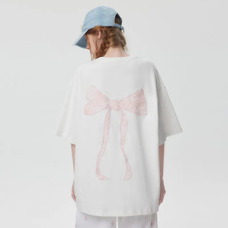 Norma® | Oversized t-shirt met geborduurde strik