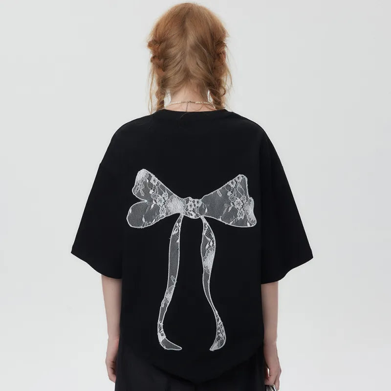 Norma® | Oversized t-shirt met geborduurde strik