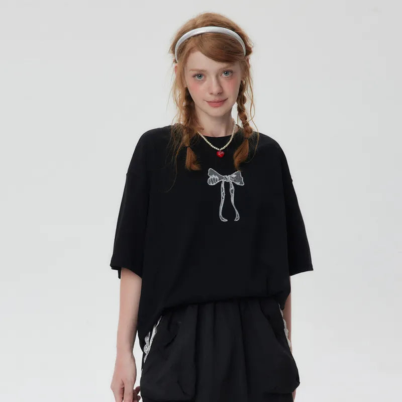 Norma® | Oversized t-shirt met geborduurde strik