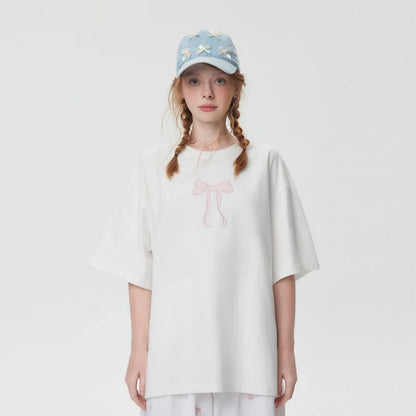 Norma® | Oversized t-shirt met geborduurde strik