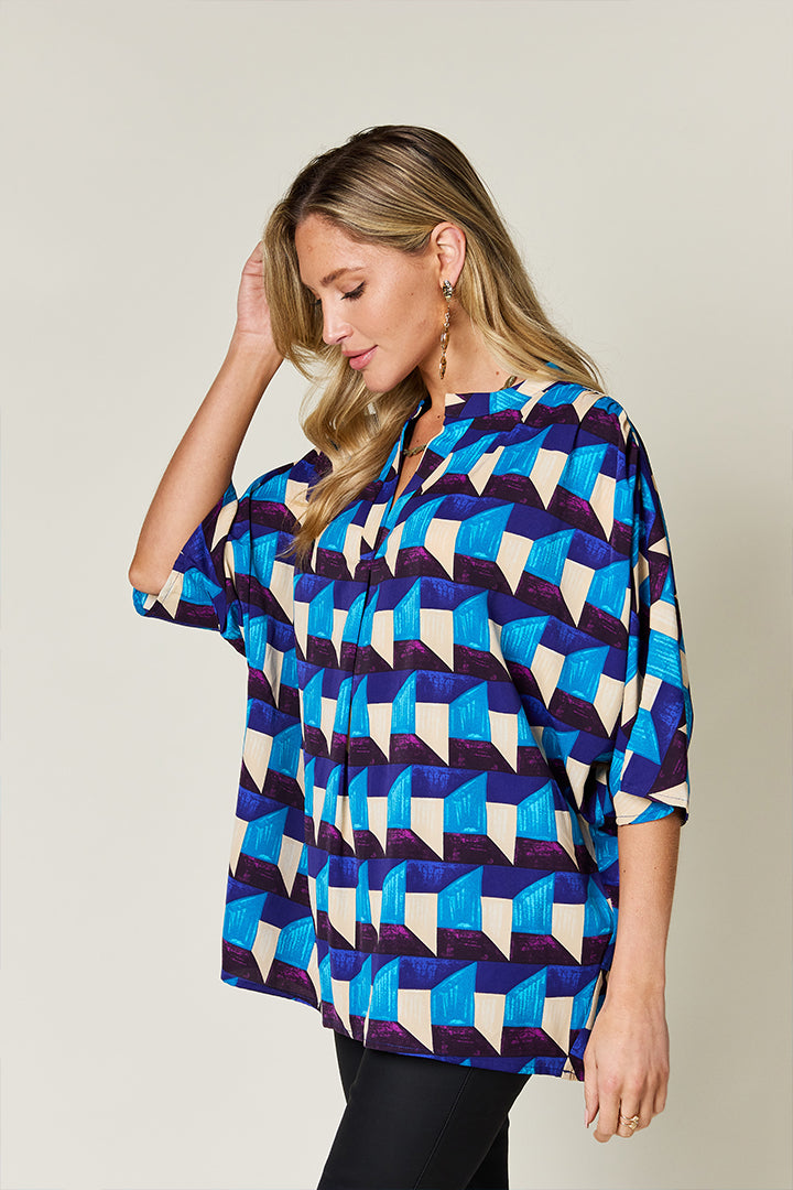 Oriana® | Full-size double-take blouse met een geometrisch patroon en halflange mouwen