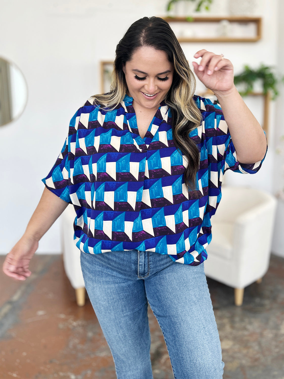 Oriana® | Full-size double-take blouse met een geometrisch patroon en halflange mouwen