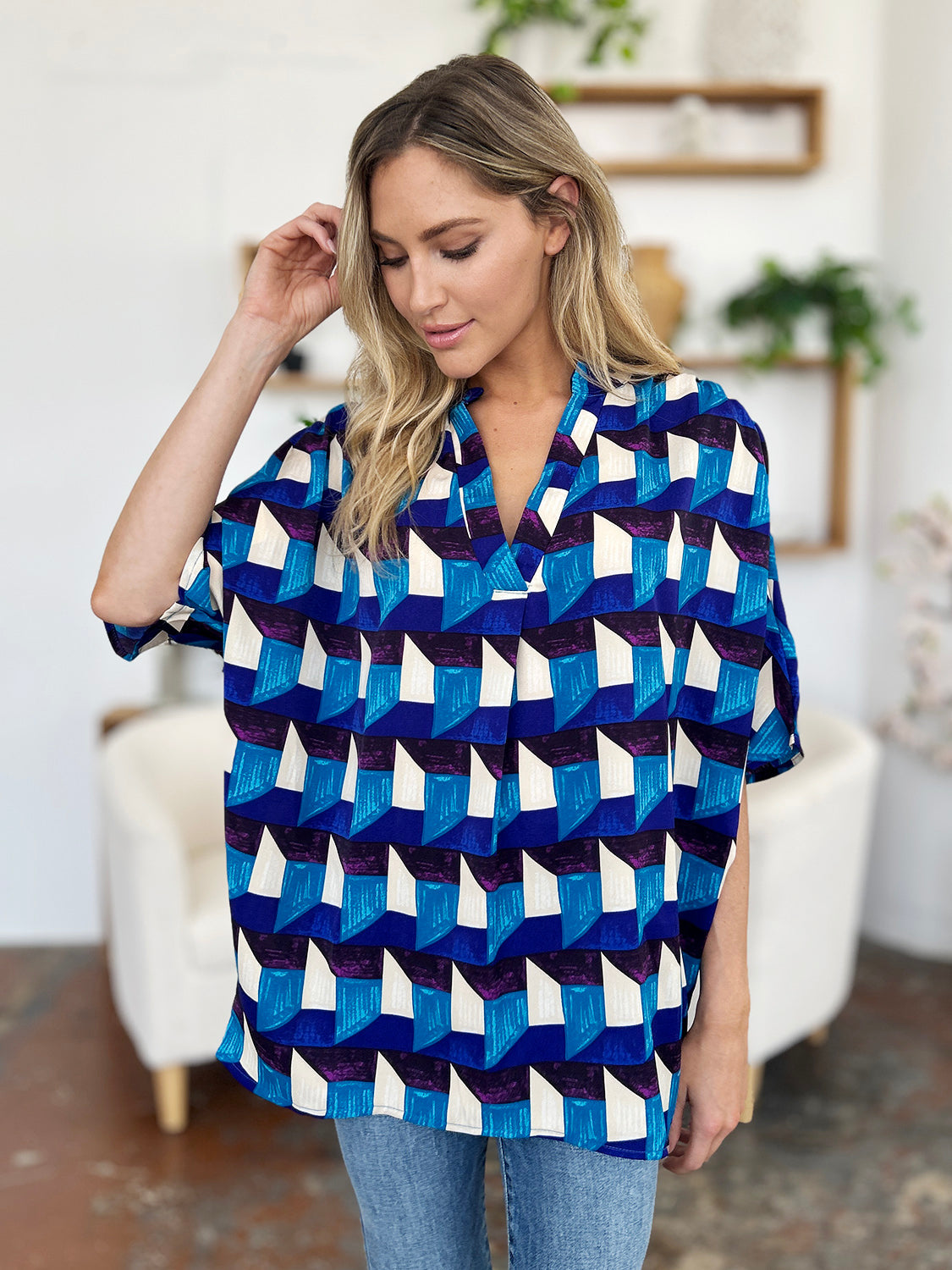 Oriana® | Full-size double-take blouse met een geometrisch patroon en halflange mouwen