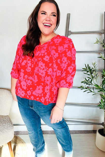 Lourdes® | New Day gebloemde geweven blouse met rood lint en strikdetail