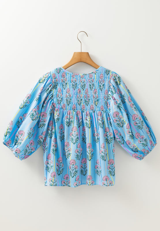 Hilda® | Gesmokte blouse met bloemmotief en strikkraag