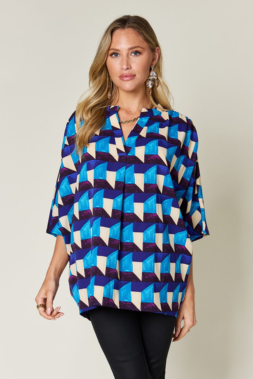 Oriana® | Full-size double-take blouse met een geometrisch patroon en halflange mouwen