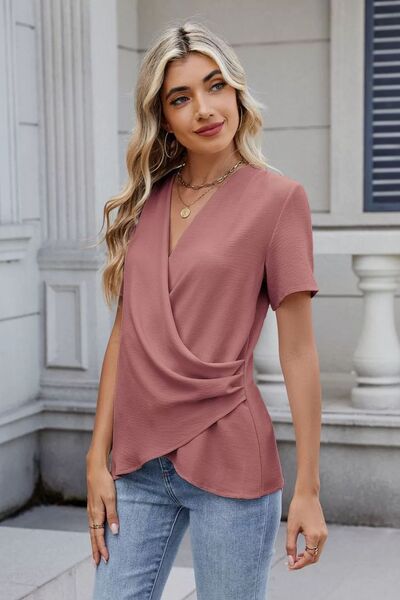 Kimberly® | Effen blouse met korte mouwen en overslagpatroon