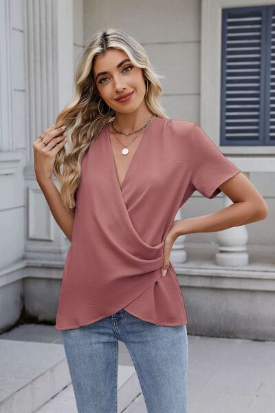 Kimberly® | Effen blouse met korte mouwen en overslagpatroon